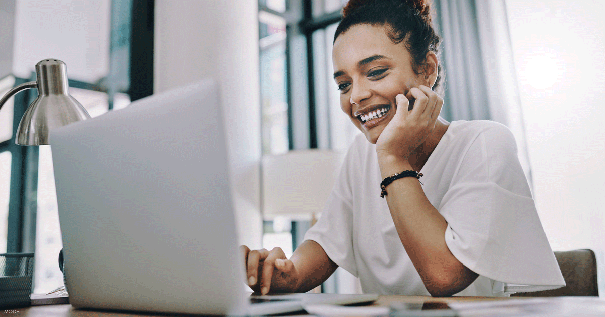 Woman in Dallas, TX considering her eye rejuvenation options to look her best during video calls